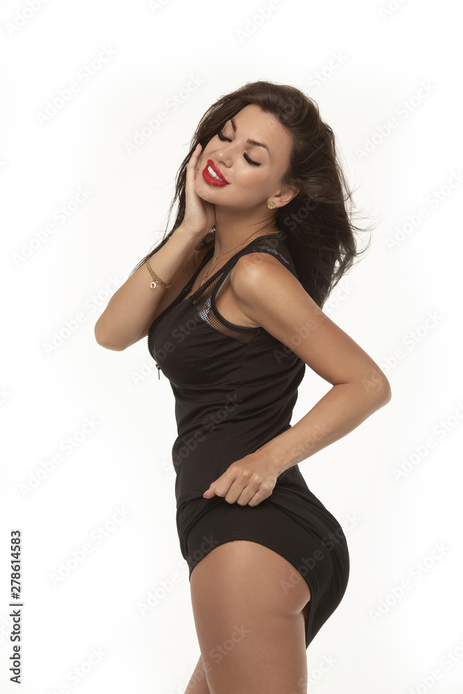 Sexy brunette lady in black dress isolated on white Sexy brunette lady in black dress isolated on white