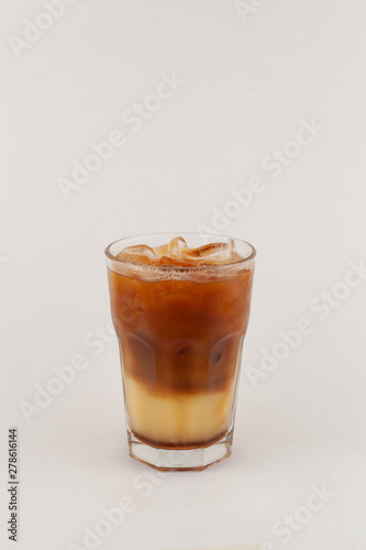 Bumble iced coffee with espresso and fresh orange juice isolated on white background
