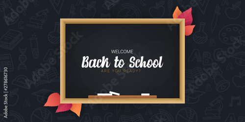 Welcome Back to School banner with chalkboard and dark hand draw doodle background.