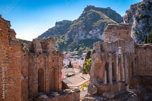 Taormina through the ruins of a Greek Theater - Sicily, Italy