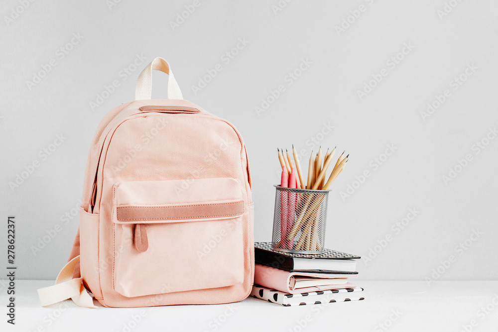 Backpack with school supplies and books for study. Back to school concept. Flat lay, top view - obrazy, fototapety, plakaty 