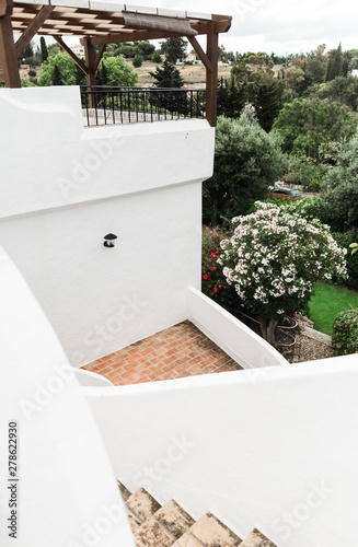 Portimao, Algerve. Portuguese architecture. Colorful buildings of the Portuguese city. Magnificent narrow streets and buildings of old european city. View of the typical beautiful architecture  photo