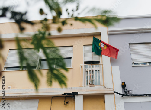 Portimao, Algerve. Portuguese architecture. Colorful buildings of the Portuguese city. Magnificent narrow streets and buildings of old european city. View of the typical beautiful architecture 