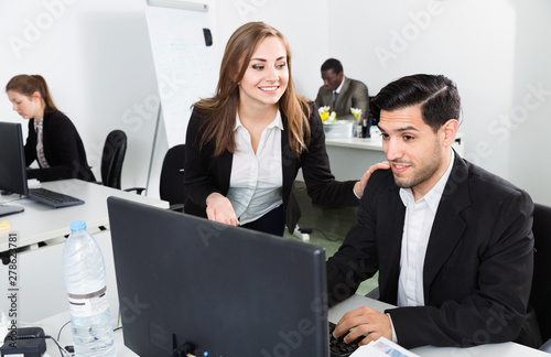 Sexual harassment between two colleagues and flirting in office photo