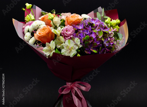 Fototapeta Naklejka Na Ścianę i Meble -  bright contrasting bouquet assembled from hydrangea, peony rose, chrysanthemum, eustoma and alstroemeria