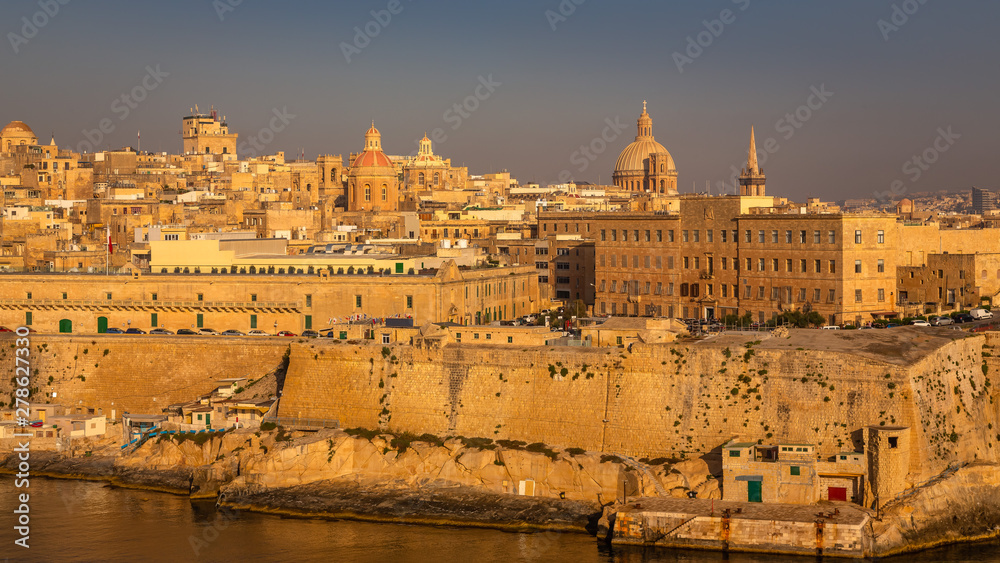 Valletta from the Ship. Exposure of Valletta, Malta, taken at Sunrise from a ship while arriving at this beautiful fortified city. Valletta from the Ship. Exposure of Valletta, Malta, taken at Sunrise from a ship while arriving at this beautiful fortified city.