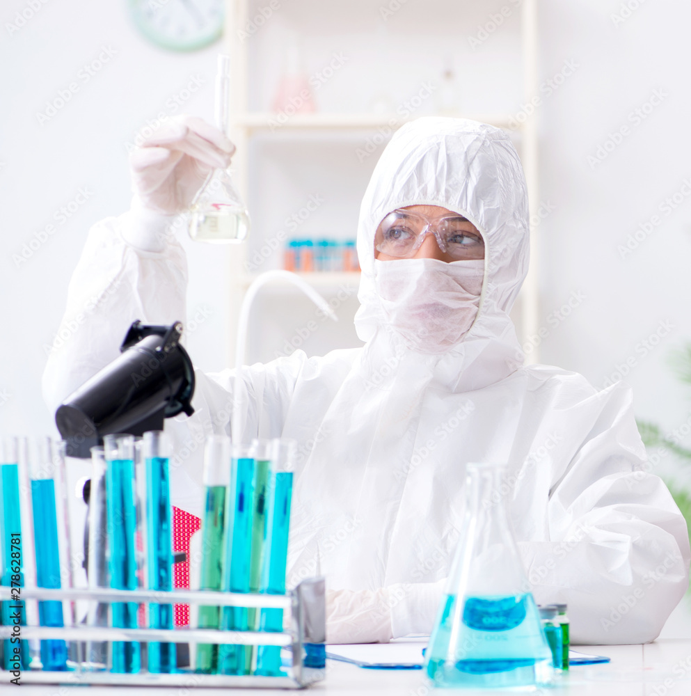 Two chemists working in the lab Two chemists working in the lab