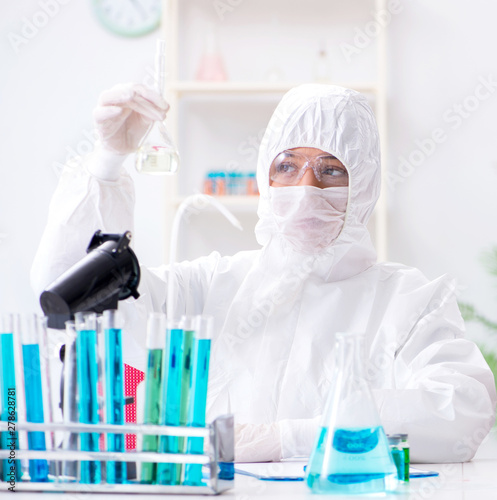 Two chemists working in the lab