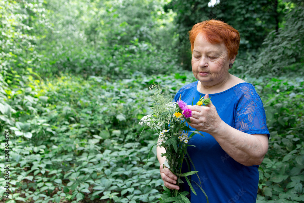 elderly woman park flowers hands bouquet green nature elderly woman park flowers hands bouquet green nature