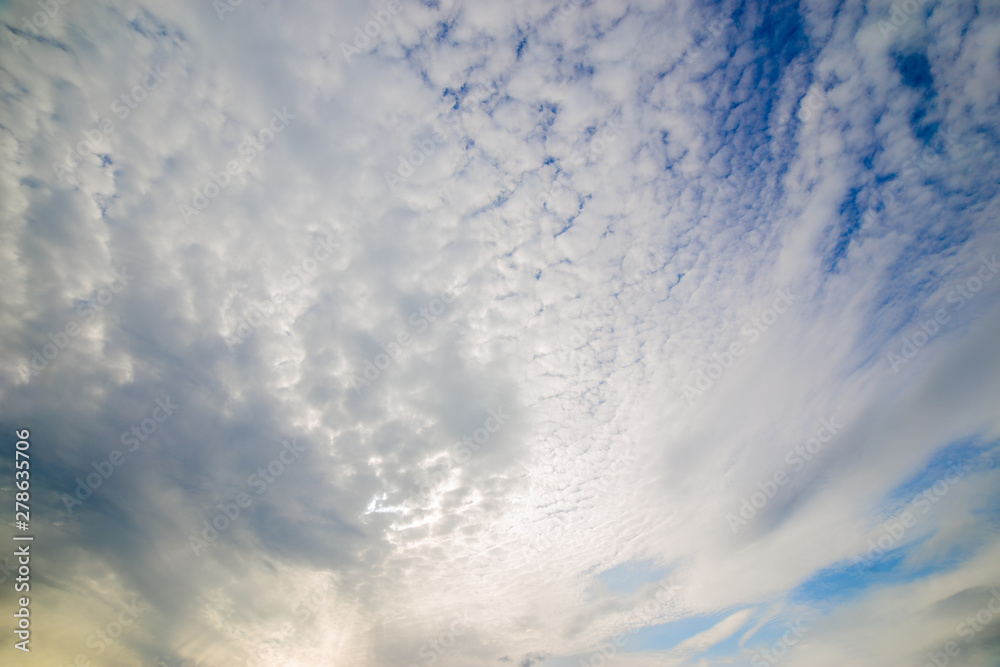Cirrus clouds in the blue sky .background Cirrus clouds in the blue sky .background
