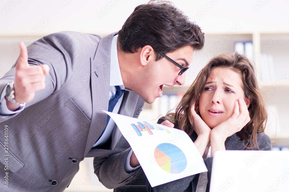 Angry boss unhappy with female employee performance Angry boss unhappy with female employee performance