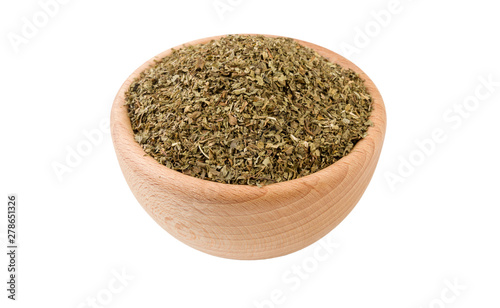 mint leaves in wooden bowl isolated on white background. 45 degree view. Spices and food ingredients.