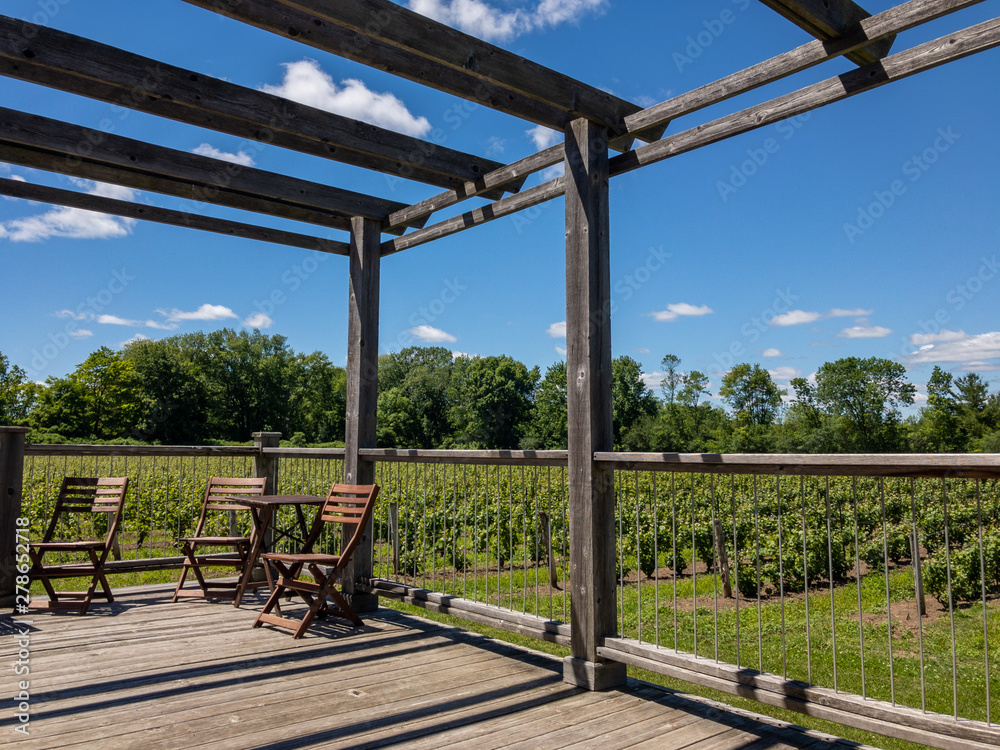 old wooden deck overlooking vineyard