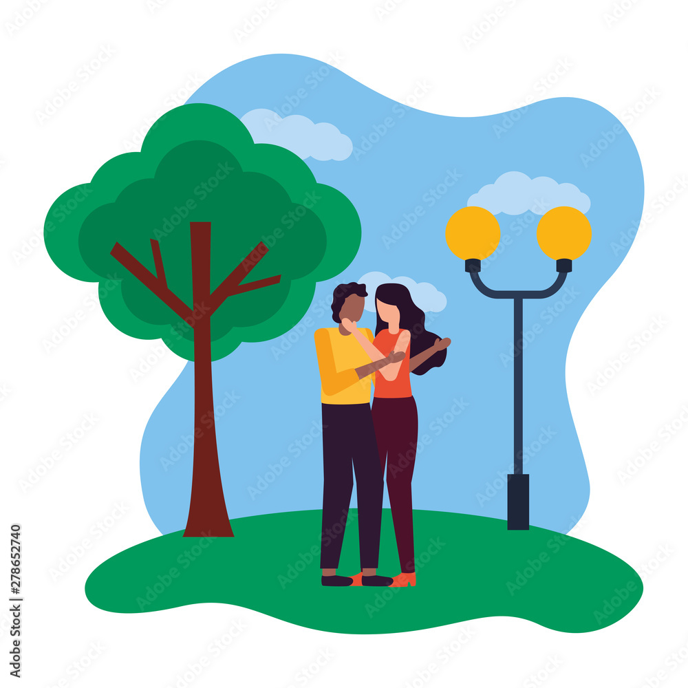 romantic couple in the park with lamp post and tree romantic couple in the park with lamp post and tree