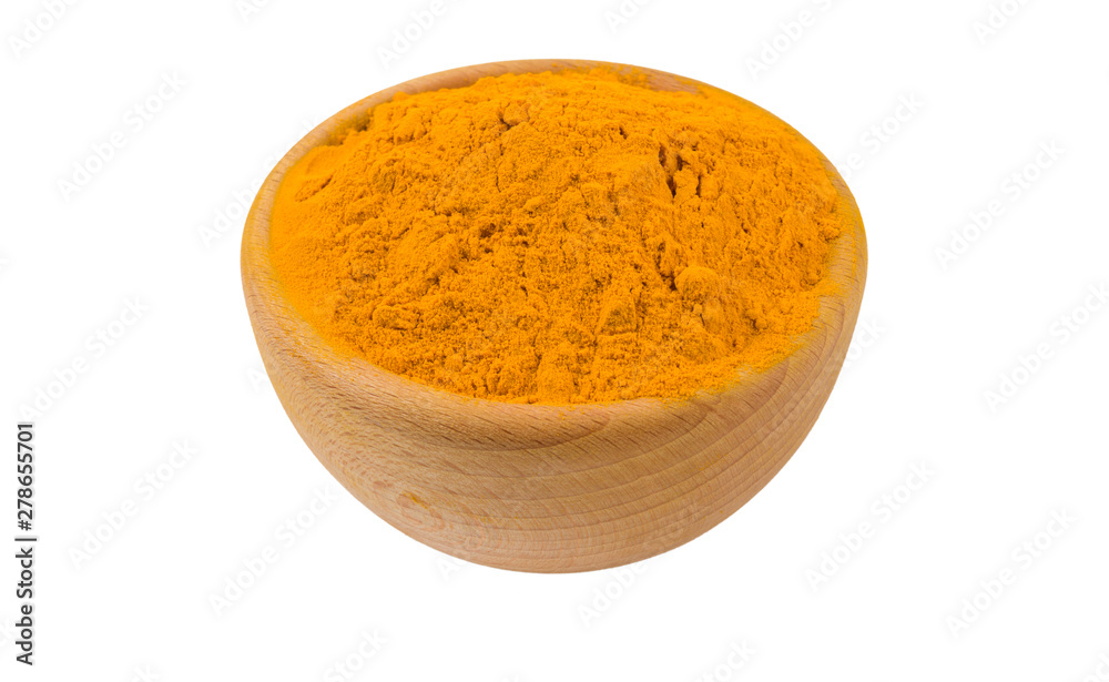 turmeric powder in wooden bowl isolated on white background. 45 degree view. Spices and food ingredients. turmeric powder in wooden bowl isolated on white background. 45 degree view. Spices and food ingredients.