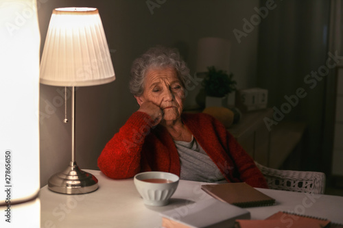 Senior woman suffering from...