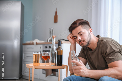 Young man with addiction to...