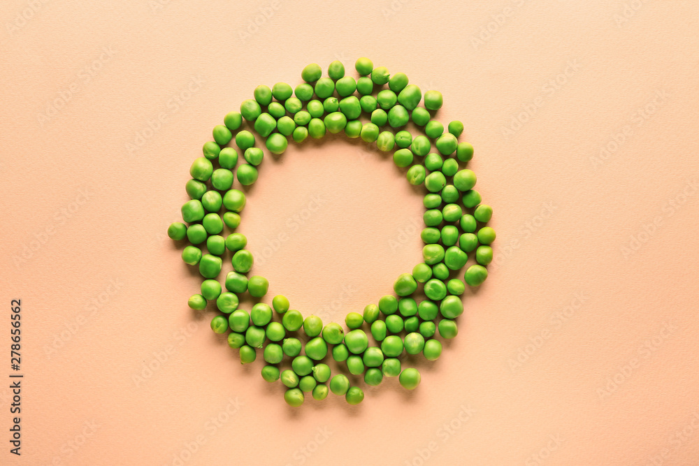 Obraz premium Frame made of tasty fresh peas on color background