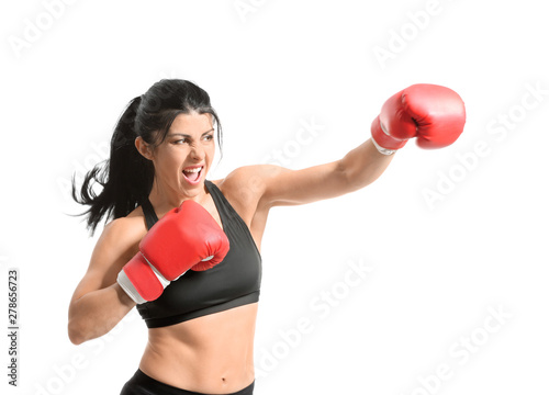 Sporty female boxer on whit...