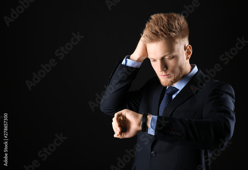 Stylish young man in formal...
