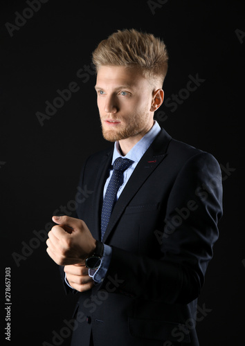 Stylish young man in formal...
