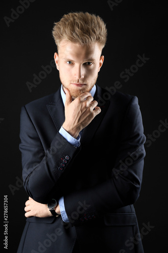 Stylish young man in formal...