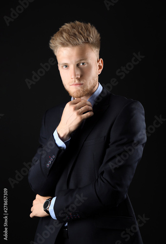 Stylish young man in formal...