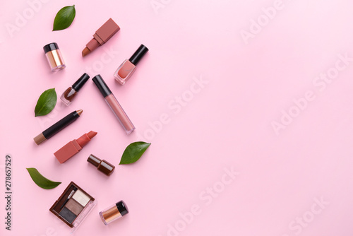 Set of decorative cosmetics on color background