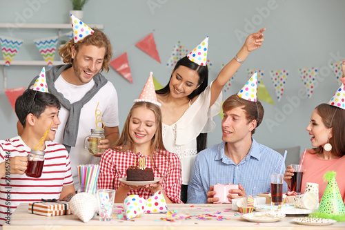 Group of friends celebratin...
