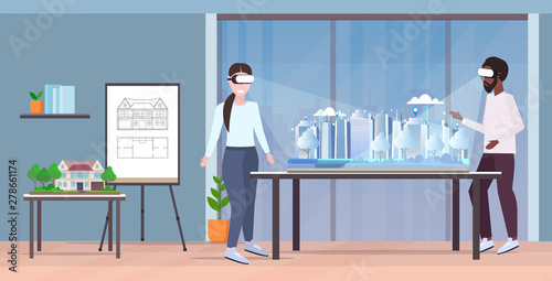 architects couple wearing digital glasses virtual reality 3d building city model headset vision concept mix race engineers team looking at city plan draftsman studio interior horizontal full length