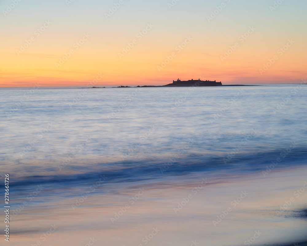 Fototapeta premium Sunset at the Moledo beach, with a mountain on backgroud
