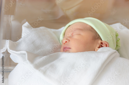 Selective focus of newborn baby boy sleeping