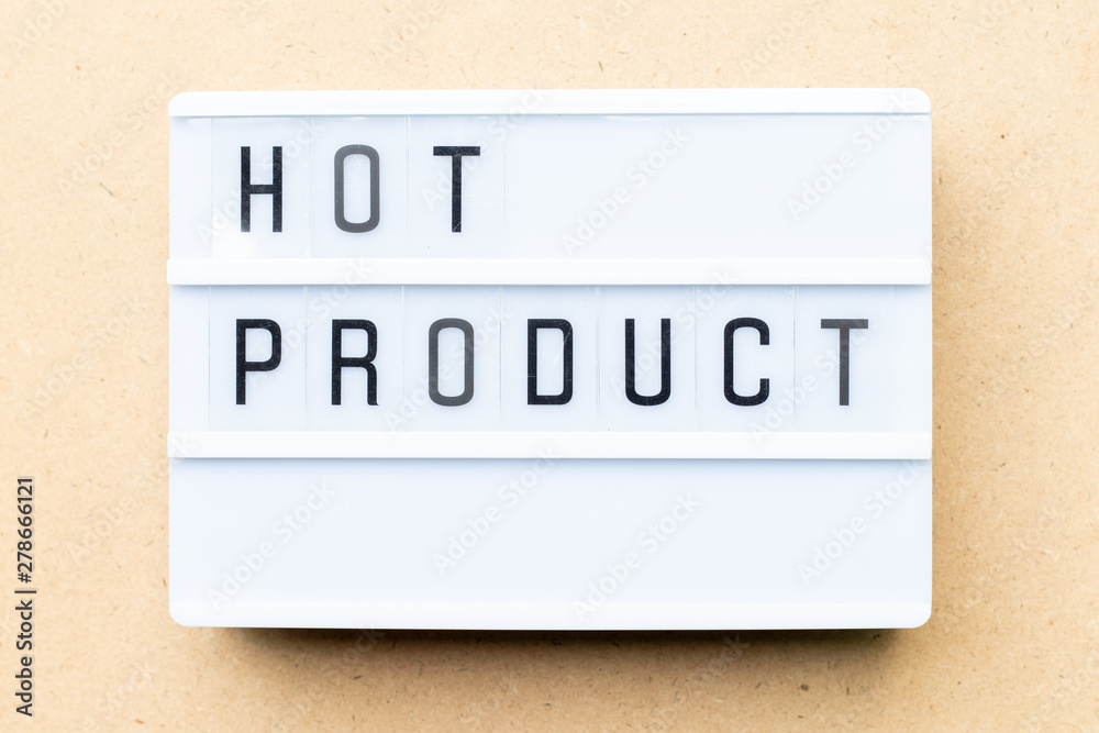 White lightbox with word hot product on wood background White lightbox with word hot product on wood background
