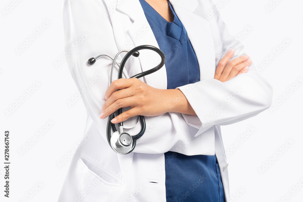 Woman doctor in white lab coat holding stethoscope on her hands Woman doctor in white lab coat holding stethoscope on her hands