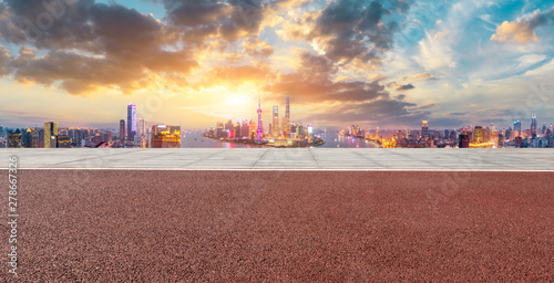 Empty square ground and modern city skyline in Shanghai at sunset,high angle view