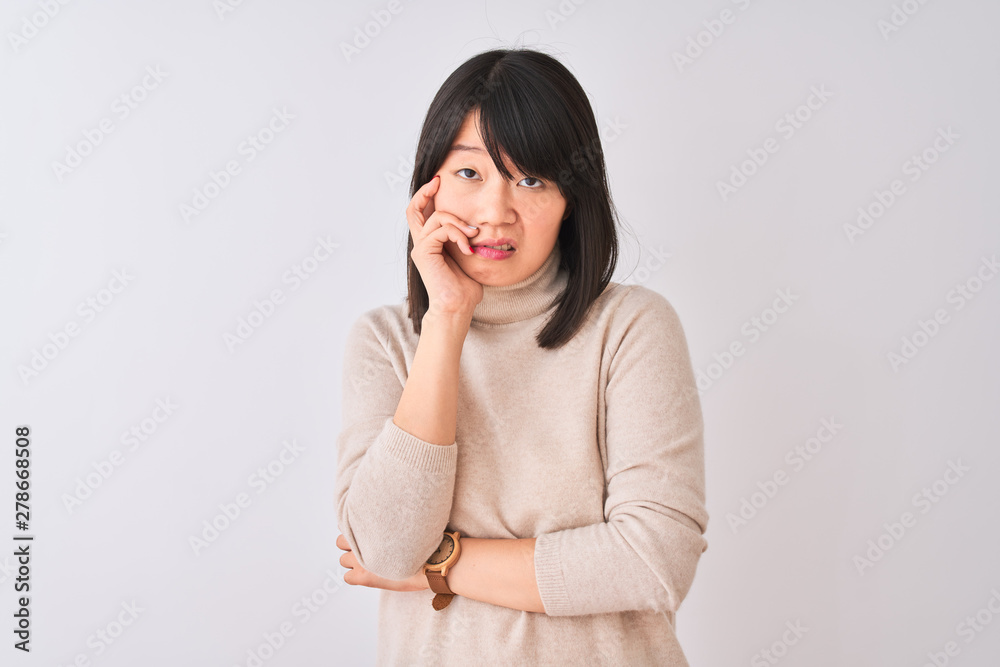 Young beautiful chinese woman wearing turtleneck sweater over isolated white background thinking looking tired and bored with depression problems with crossed arms.