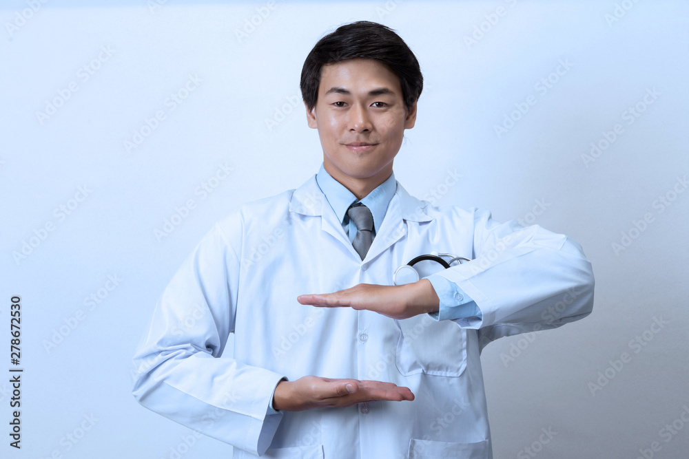 Doctor, medical professional holding something in empty hand Doctor, medical professional holding something in empty hand