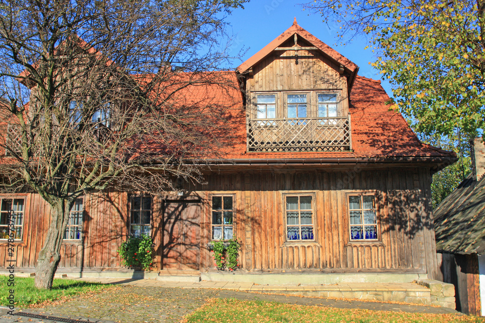 LANCKORONA, POLAND - SEPTEMBER 17, 2016: Historic city centre of Lanckorona, polish resort. Wooden huts, inscribed on UNESCO world heritage list LANCKORONA, POLAND - SEPTEMBER 17, 2016: Historic city centre of Lanckorona, polish resort. Wooden huts, inscribed on UNESCO world heritage list