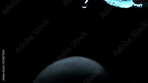 vfx plate shot of water spill drops on black sphere head and background v08 photo