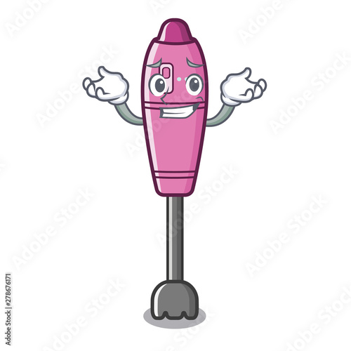 Grinning immersion blender placed in character box photo
