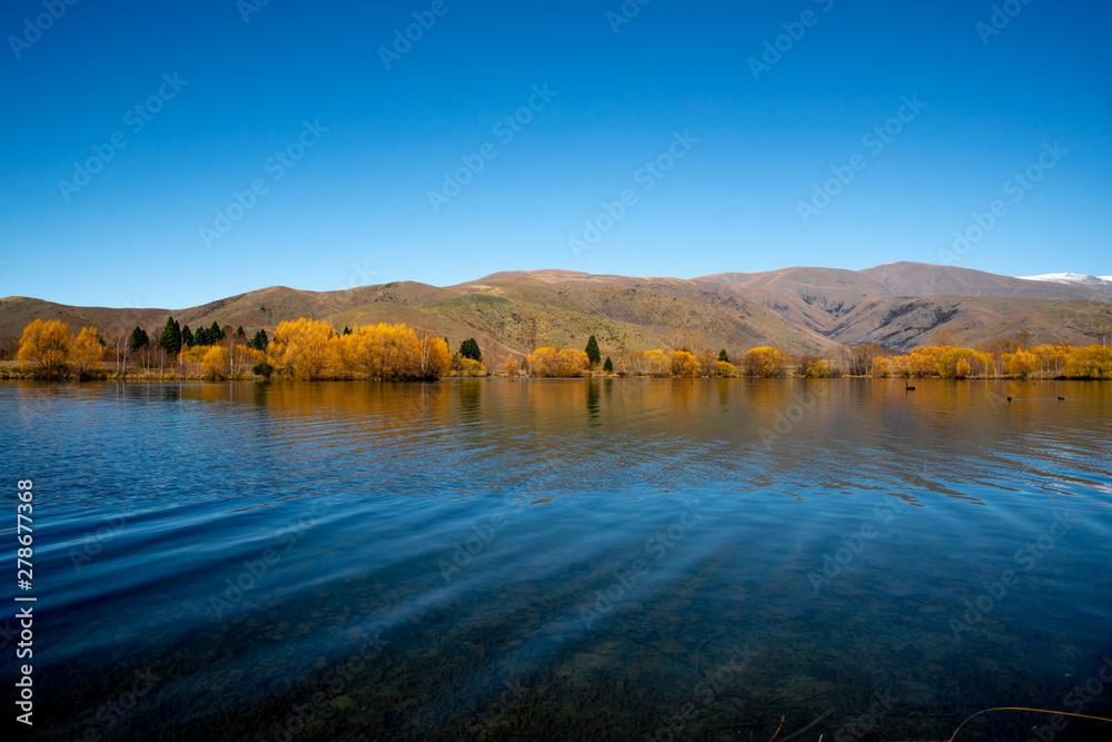 Majestic scenery of the Lakes and rivers of the South Island beneath the Southern Alps in New Zealand