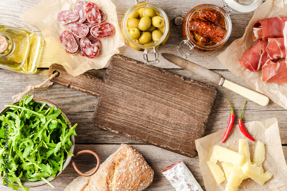 Italian food on wooden background