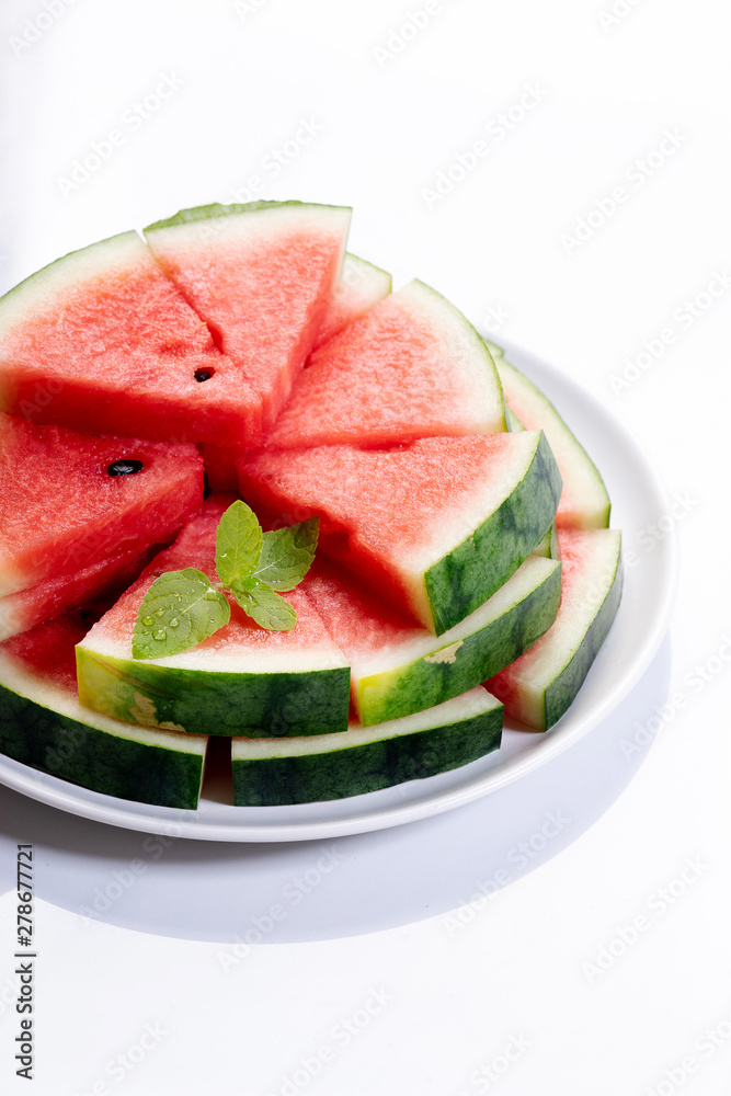 Slices of fresh watermelon on white marble background Slices of fresh watermelon on white marble background