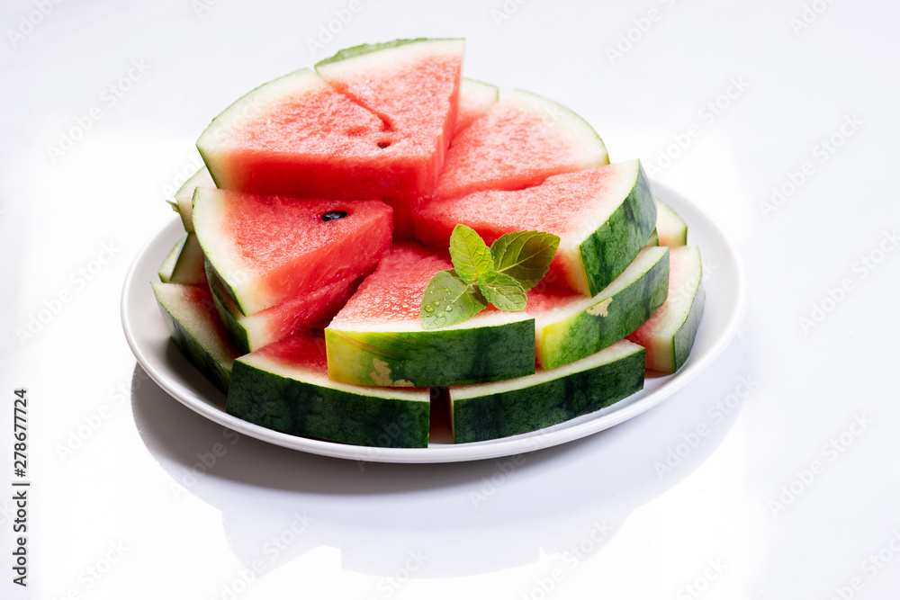 Slices of fresh watermelon on white marble background Slices of fresh watermelon on white marble background