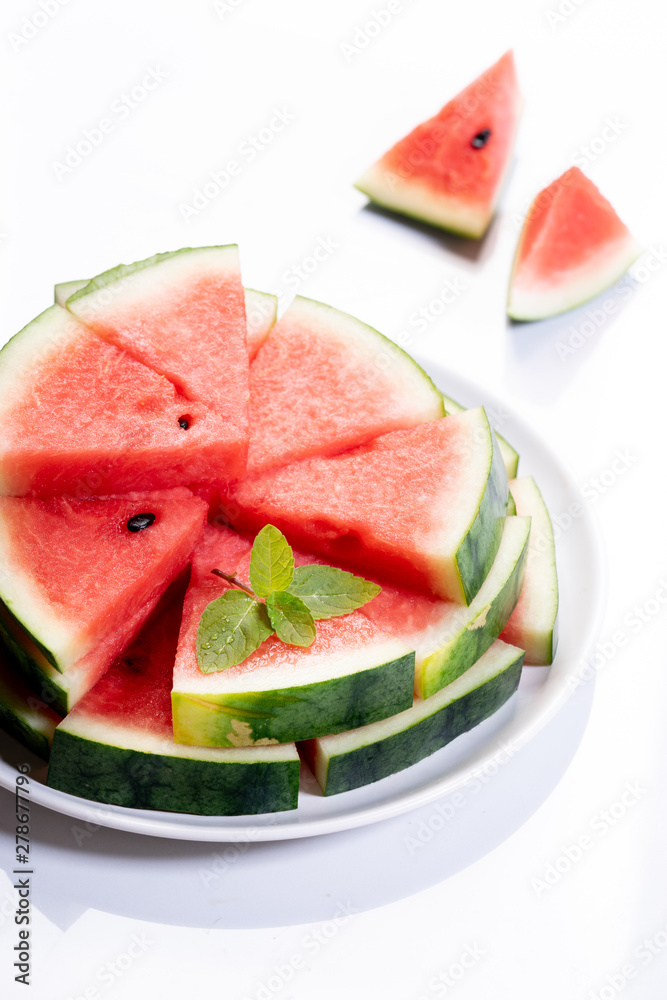 Slices of fresh watermelon on white marble background Slices of fresh watermelon on white marble background