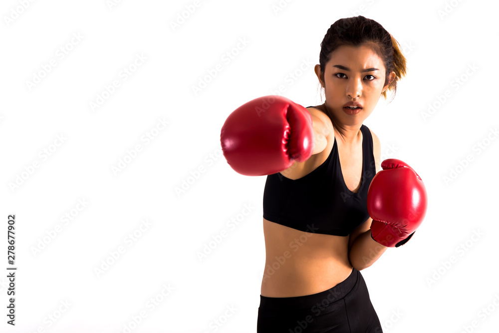 Portrait of a young female boxer punching on white isolated background with copy space. Young Asian woman doing boxing exercise with serious look. Portrait of a young female boxer punching on white isolated background with copy space. Young Asian woman doing boxing exercise with serious look.