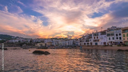 Time lapse of an amazing sunset in Calella de Palafrugell (Costa Brava) with amazing clouds in movement. Girona, Spain. photo