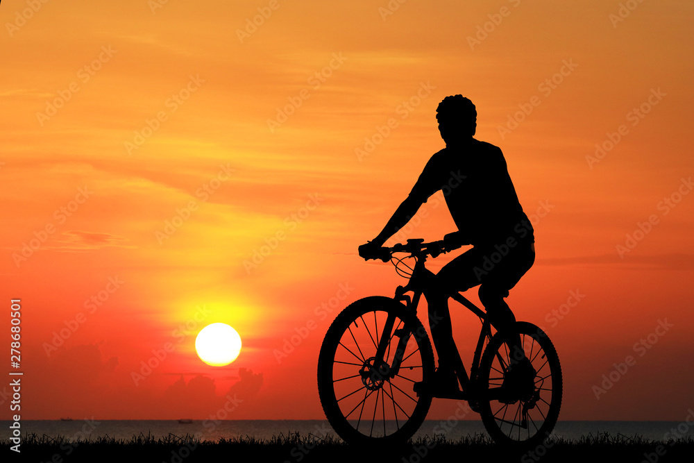 Silhouette Cycling on blurry sunrise sky background. Silhouette Cycling on blurry sunrise sky background.