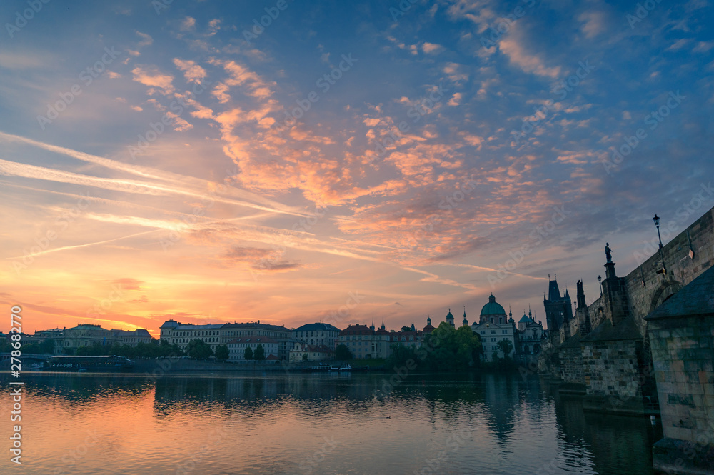 Prague cityscape with historic architecture at sunrise