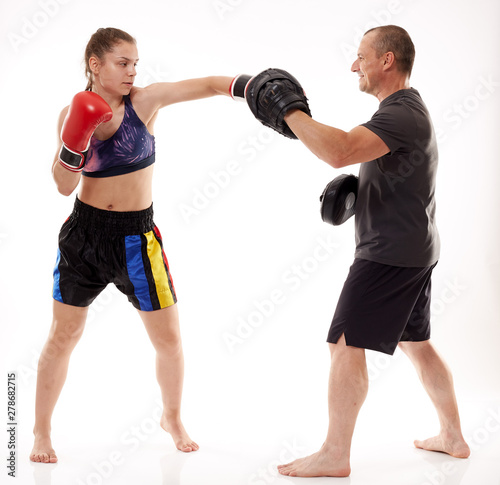 Kickboxing girl and her trainer